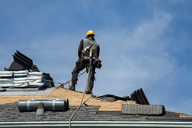 Professional Storm Damage Roof Repair technician working in Cleveland, WI